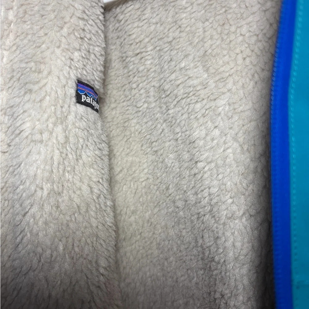 Patagonia Blue Jacket with Yellow Details